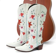 Experience the perfect blend of rugged and feminine with our Cowboy High Boots! These boots feature elegant embroidered flowers and hearts, giving you the best of both worlds. Made with high-quality materials, you'll have durable, stylish boots for any adventure. Elevate your western look with our Cowboy High Boots. Size Preference: Size 33=215mm=8.46inch(bare feet length) Size 34=220mm=8.66inch(bare feet length) Size 35=225mm=8.86inch(bare feet length) Size 36=230mm=9.06inch(bare feet length) Size 37=235mm=9.25inch(bare feet length) Size 38=240mm=9.45inch(bare feet length) Size 39=245mm=9.65inch(bare feet length) Size 40=250mm=9.84inch(bare feet length) Size 41=255mm=10.04inch(bare feet length) Size 42=260mm=10.24inch(bare feet length) Size 43=265mm=10.43inch(bare feet length) Size 44=270 Custom Cowgirl Boots, Pattern Boots, Custom Cowboy Boots, Summer Camp Wedding, Flowers And Hearts, Embroidered Boots, Boots Patterns, Camp Wedding, Western Look