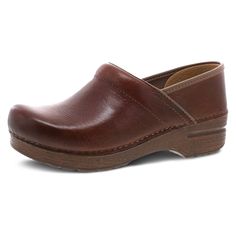 PRICES MAY VARY. ALL DAY COMFORT: The Dansko Professional is our flagship clog. Inside its iconic silhouette is a roomy reinforced toe box, an anatomically contoured PU midsole, an inner frame for stability and support, a padded instep collar, and a protective heel counter that allows the heel to move up and down freely while providing lateral stability. LONG STANDING SUPPORT: The anti-fatigue rocker bottom assists with forward motion while walking to add hours of comfortable support throughout Clogs For Women, Shoes Stand, Wide Heels, Leather Socks, Clothes Shopping, Dansko Shoes, Leather Clogs, Professional Women, Clogs Shoes