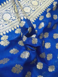 Dupatta length: 2.40 m Dupatta width: 0.9 m Blended Dry clean This dupatta is made of finely woven fabric and is decorated with intricate design and engravings Banarasi dupattas are characterised by brocade borders & pallus. They often have woven buti or jall on the body Luxury Blue Tussar Silk Dupatta, Gold Unstitched Jamawar Suit With Traditional Drape, Gold Unstitched Suit In Jamawar With Traditional Drape, Gold Jamawar Unstitched Suit With Traditional Drape, Traditional Drape Banarasi Silk Anarkali Set With Pallu, Gold Unstitched Jamawar Suit For Festivals, Anarkali Style Jamawar Dupatta With Pallu, Banarasi Silk Anarkali Set With Pallu, Gold Jamawar Unstitched Suit For Festivals