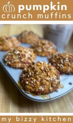 pumpkin crunch muffins on a baking sheet with text overlay that reads, my bizzy kitchen