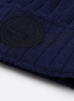 Italian recycled wool and cashmere, heavy, wide gauge beanie with Recycled Planet logo patch. 35% Recycled Nylon, 30% Viscose, 30% Recycled Wool, 5% Recycled Cashmere Women's One Size Fits All Made in Italy Winter Outdoor Beanie With Logo Patch, Winter Cotton Beanie With Logo Patch, Planet Logo, Recycled Cashmere, One Size Fits All, Patch Logo, Cashmere, In Italy, Coding