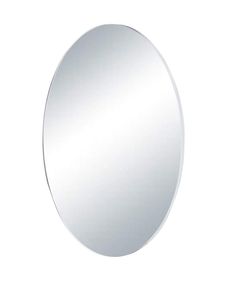 a round mirror is shown on the wall