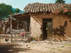 a painting of a house with flowers on the roof and a horse standing in front of it