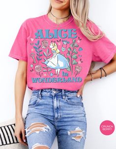 Step into the whimsical world of Wonderland with our Vintage Alice in Wonderland Tee! This charming t-shirt features classic imagery from the beloved tale, capturing the essence of curiosity and adventure. Made with soft, high-quality cotton, it's perfect for adding a touch of nostalgia to your wardrobe. Join Alice on her journey through the looking glass and let your imagination run wild with this enchanting tee! Vintage Alice In Wonderland, Whimsical Wonderland, Presents For Mom, Through The Looking Glass, Alice In Wonderland, Home Crafts, Korean Fashion, Daisy, Essence