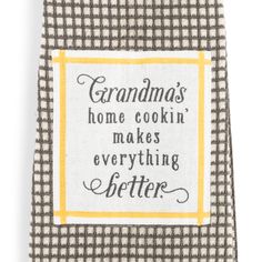 a kitchen towel with the words grandma's home cookin makes everything better