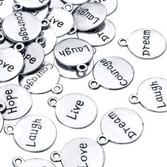 PRICES MAY VARY. PACKAGE CONTENT -- You will receive 60pcs silver inspirational words charms, enough quality for your crafts making. QUALITY ALLOY -- These words pendants charms are made out of good quality alloy, which is durable, sturdy and with good workmanship. 6 STYLES -- Including 6 kinds of motivational words: live, dream, hope, love, courage and laugh, offering more choice for your needs. MEANINGFUL CHARMS -- Each word charm has motivational, inspirational and encouraging word, which wou Cheap Personalized Round Charms, Gold Charms, Jewelry Making Charms, Silver Charm Bracelet, Motivational Words, Letter Charms, Jewelry Projects, Gold Charm, Silver Hoop Earrings