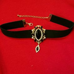 Elegant Choker Rhinestones Diamond/ Black Looks Like Velvet Choker With 3" Extension. Approximately 11 3/4" Long With 3" Extension X Choker 3/4" X Center Piece 2 1/2" Long X 1 1/4" Wide. Never Worn. 14 Years And Above. This Item Is Made In Compliance Under Proposition 65. Black Rhinestone Party Choker, Party Black Choker With Rhinestones, Party Black Rhinestone Choker, Black Rhinestone Choker Jewelry, Elegant Black Choker With Rhinestones, Elegant Black Rhinestone Choker, Elegant Choker, Yellow Gems, Black Velvet Choker