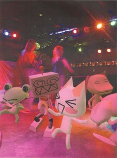 several cartoon figures on stage with lights in the background