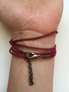 "BUY TWO GET A THIRD FOR FREE!! (please, don't add your free product to your shopping cart or you will be charged for it. Pick 1 product and leave the full name of it in the \"Note to enjoywelrydesign\" Box during checkout.)This is a waxed cotton Karma bracelet with an alloy metal bronze ring charm. What goes around, comes around. Wear your bracelet as a reminder, to keep the circle positive, peaceful and loving. The bracelet is adjustable and fits wrists from 51/2'' to 81/2\" (14cm to 22cm). Fi Bohemian Adjustable Cord Friendship Bracelets As Gift, Bohemian Friendship Bracelets With Adjustable Cord, Bohemian Adjustable Cord Friendship Bracelets, Bohemian Wrap Bracelet With Sliding Knot As Gift, Bohemian Wrap Bracelet With Adjustable Length As Gift, Adjustable Bohemian Wrap Bracelet As Gift, Bohemian Style Adjustable Friendship Bracelets, Adjustable Casual Friendship Bracelets Best Friend Gift, Adjustable Casual Friendship Bracelets For Best Friend