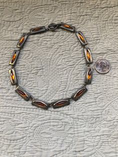 Up for your consideration is a Rare Danish Mid Century Modern Jorgen Jensen Pewter and Amber Glass Choker Toggle Necklace.  This striking necklace measures 16" x 3/8".  It is marked on the back Pewter Jorgen Jensen DENMARK 230.  If you have any questions, please don't hesitate to e-mail me and be sure to check out my other items for sale.  Thanks for looking. Dot Necklace, Danish Mid Century Modern, Indie Jewelry, Toggle Necklace, Vintage Turquoise, Jade Pendant, Rolo Chain, Jewelry Inspo, Amber Glass