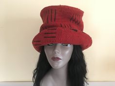 "This is a wide-brim cloche hat made of soft luxurious, perfectly imperfect, Mud Cloth with black designs throughout.  Its red and black color is rare and therefore, all the more desirable.  It has understated elegance in style and can be worn, for any occasion during any season.  Both women and men can rock this style hat!  It is versatile and its look can be changed simply by your mood.  The hat is one of a kind, but it can be made for you in, either a variety of red and black prints, or a different color.  Currently, because of the extremely limited availability of this specific red and black pattern, the fabric, if accessible, is quite costly. - Handmade - Mud Cloth - Black satiny lining -Warm interfacing  - Generous sizing will accommodate big hairdos To personalize your hat for the b Black Prints, African Hats, Fall Hat, Cloche Hats, Fall Hats, African Trade Beads, Handmade Hat, Cloche Hat, Red Hat