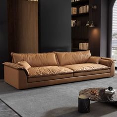 a living room filled with furniture and bookshelves