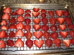 fresh strawberries on a cooling rack ready to be cooked