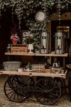 an old fashioned cart with drinks on it