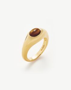 Savi Sculptural Gemstone Stacking Ring | 18ct Gold Plated Vermeil/Tiger's Eye. Pared-Back Modern Meets Vintage. This Sculptural Stacking Ring is Embellished with a Raised Tiger's Eye Oval Cabochon Gemstone. Team with Chunkier Rings for a Standout Ring Stack. A Collection Designed in Collaboration with the Beijing-Born Tastemaker Behind Savislook, Inspired by Architecture and Organic Forms. Metal: 18Ct Recycled Gold Plated Vermeil on Recycled Sterling Silver Gemstone: Tiger's Eye Dimensions: 8. 1 Black Agate Ring, Gemstone Stacking Ring, Organic Forms, Ring Stack, Tigers Eye Gemstone, Chunky Rings, Tiger Eye Stone, Agate Ring, Eye Stone