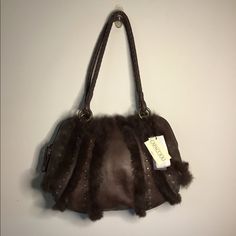 Fine Italian Leather With Rabbit Fur Leather Evening Bags For Winter, Winter Leather Tote Bag, Elegant Brown Bag For Winter, Elegant Brown Winter Bags, Leather Shoulder Bag For Winter, Winter Leather Shoulder Bag, Brown Leather Bags For Winter, Winter Leather Shopping Bags, Chic Leather Bags For Winter