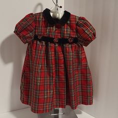 Starting Out Red Plaid Dress With Peter Pan Collar And 3 Cute Plaid Flower Details On Front. Plaid Has Beautiful Sparkle. Collar And Sash Is Black. Soft Liner. Nwot. Fast Shipping. Reasonable Offers Considered. Red Short Sleeve Winter Dresses, Red Plaid Dress, Peter Pan Collar, Plaid Dress, Red Plaid, Kids' Dresses, Baby Dolls, Plaid, Collar