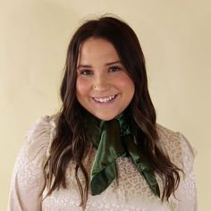 Brunette model wearing a long sleeve, iviry leopard print top with an olive green scarf tied around her neck. This model is pictured in front of a beige background. Elegant Green Scarves For Spring, Elegant Green Scarf For Formal Occasions, Classic Spring Scarves For Formal Occasions, Chic Solid Color Formal Scarves, Classic Formal Scarves For Spring, Classic Spring Formal Scarves, Chic Solid Scarves For Spring, Elegant Green Scarves For Party, Elegant Green Scarf For Winter