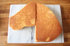 a piece of bread that is on a cutting board