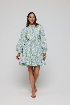 Exude refinement in the Louisa mini-tunic dress. Floral romance drapes each inch of this tiered, cinched, silky piece. A cascading bodice and long-sleeved, structured details harmonize for event wear that is unique, chic, and timeless. For this dress, we recommend purchasing one size larger than you would normally wear! Mini Tunic Dress, Perfect Swimsuit, Southern Belle, Fashion Fits, Shirtdress, Dress Floral, Favorite Dress, Mykonos, Mandarin Collar