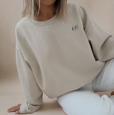 You can personalize this sweater with your own initials. It's simple and elegant, and you can wear it all the time.  PRODUCTION TIME: 1-5 days (Usually 2-3 days)  SHIPPING TIME: 2-5 days (Usually 3 days)  PRODUCT DESCRIPTION: Gildan 18000 Unisex Sweatshirt Super soft cotton and excellent quality print makes. Luxury soft-touch feel Finished with ribbed collar, cuff & hem Brushed inner fleece for a super-soft hand feel 40% Cotton 60% Polyester blend Our Relaxed Fit (Gildan 18000) is a unisex style Minimalistic Aesthetic, Perfect Sweater, Oversize Pullover, Mama Sweatshirt, Pregnancy Reveals, Mom Sweatshirt, Dtg Printing, Grandma Gifts, Vintage Sweaters