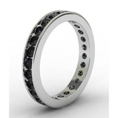 a white gold ring with black diamonds