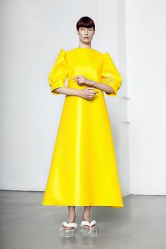 "Maxi dress in faux leather fabric, yellow concealed zip at the back, and 3/4 tapered sleeves, Seam at the waist. Lined. Concept design, ready to ship, handmade by Inga Skripka. size can be ordered contact with me, if you need fast shipping or other size Model wears: Bust (around): 34 inch (86 cm) Low-Hip (around): 38 inch (96 cm) Shoulders ( around) : 38 inch ( 96 cm ) Sleeves: 18 inch (45 cm) Length: 56 inch (142 cm ) HEIGHT OF MODEL: 5'8\" inch (173 cm) I usually ship every day except Sunday. Dress Minimal, Vinyl Dress, Basic Dress, Style Mistakes, Women Dress, Minimal Design, Dress Clothes For Women, Yellow Dress, Dress Fabric