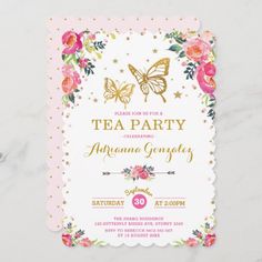 a pink and gold tea party with flowers on the front, butterflies on the back