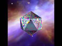 an abstract cube is floating in the air