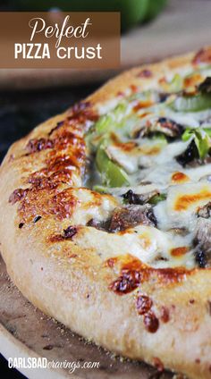 a pizza sitting on top of a wooden cutting board