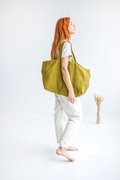 "FREE EXPRESS DELIVERY FOR ALL ORDERS OVER 60 EUR! (2-7 working days) FedEx, UPS, GLS, DPD. This large linen bag is perfect for a long-awaited summer holiday, picnic, or trip to the beach. Made of soft heavyweight linen that feels lovely to the touch. Roomy enough for large towels along with other essentials. The bag has an extra linen lining, so it can easily withstand heavier items. * Which is your favorite color? Olive / Ocean / Terracotta. Beach bag approx. size: Height: 35 cm / 14\" Length: Green Canvas Bags For Summer, Linen Tote Beach Bag For Travel, Summer Linen Canvas Travel Bag, Summer Linen Canvas Bag For Travel, Eco-friendly Linen Canvas Bag For Beach, Eco-friendly Linen Canvas Beach Bag, Cotton Weekender Bag For Everyday Summer Use, Summer Cotton Weekender Bag For Everyday, Large Capacity Linen Canvas Bag For Travel