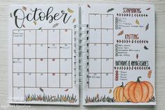 an open planner book with the words october written on it and pumpkins in the background