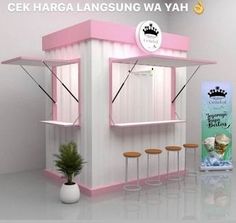 a small booth with stools and a sign that says, cek harag langung wa yah