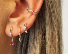 ✨Colourful earring stack silver huggie hoops and ear cuff earring set. This everyday silver earring stack are modern, original and minimalist, perfect to compliment a simple everyday outfit or for an occasion as well.  ✨Product specifications:  * Material: Sterling Silver with Zircon stone.  * Hoops Diameter (inner): 7mm.  * Hoops width: 2mm. ✨✨FREE PERSONALISED GIFT POUCH WITH EVERY ORDER Select a gift pouch colour (lilac or cream - refer to the last photo for guidance) and make it your own by adding up to 10 letters or numbers as a personal touch. I will gladly include a gift message. ✨Shipping:  * All orders will be shipped out within 1 business day by first-class Royal Mail service after receiving the order.  *UK delivery estimate: 1-2 working days *Europe delivery estimate: 3-5 workin Earring Stack Silver, Silver Ear Stack, Silver Earring Stack, Silver Earring Set, Stacking Earrings, Earring Stack, Multiple Ear Piercings, Cuff Earring, Stacked Earrings