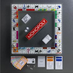 the monopoly board game is shown with its pieces laid out and ready to be played