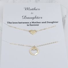 "Mother Daughter Necklace Set. 14K gold necklace Mother's necklace: - 14K gold charm is about 13mm. - 14K gold necklace Daughter's Necklace: - 14K gold heart charm is about 10mm x 8mm - 14K gold necklace Necklace size chart: average 0 - 12 months 10\" average 12 - 24 months 12\" average 2-3 years 13\" average 4-5 years 14\" average 5-10 years 15\"-16\" 14K gold components Your necklaces will be shipped in a gift box. To see other Mother daughter set click here: https://www.etsy.com/shop/SashJewe Mother Daughter Necklaces Set, Other Mother, Mother Daughter Necklace, Mother Daughter Gifts, Daughter Necklace, Mothers Necklace, Gold Heart Necklace, 14k Gold Necklace, Necklace Necklace