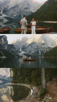 two people standing on the shore of a mountain lake with canoes and mountains in the background