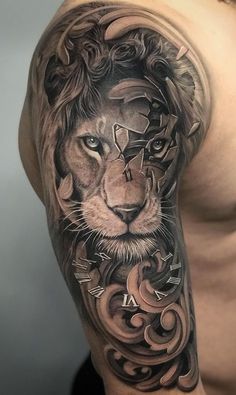 a man's arm with a lion tattoo on the left side of his body