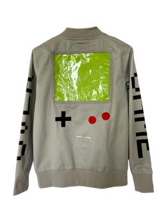 This nostalgic gamer-themed Ita Jacket is part of our second Kickstarter collection, which includes a matching insert! Made with a lighter material for spring/summer, this jacket will look stylish and cool on both casual and avid gamers alike. Pockets Large game screen PVC pocket Embroidered detailing on front and back Screen-printed sleeves Default jacket insert Ribbed trim 'I love Ita bags and I wanted to make something that could feature pins and accessories that wasn't a backpack/traditional Gamer Hoodie, Ita Bags, Workout Schedule, Classic Games, Look Stylish, Printed Sleeves, Varsity Jacket, Size Chart, Spring Summer