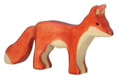 an orange and white fox figurine on a white background