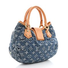 This is an authentic LOUIS VUITTON Monogram Denim Pleaty in Blue. This is a stylish bag that is crafted of Louis Vuitton monogram pleated denim. This mini handbag features a vachetta cowhide leather handle with polished gold toned hardware and a crossover strap with a gold toned press-lock. This opens to a saffron yellow microfiber interior with a pocket. Pleated Denim, Saffron Yellow, Mini Handbag, Mini Handbags, Stylish Bag, Authentic Louis Vuitton, Leather Handle, Cowhide Leather, Crossover