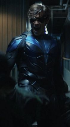 a man dressed as batman in the dark knight movie