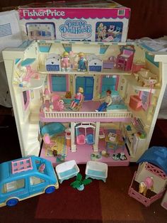 a doll house with furniture and accessories in it