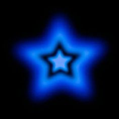 a blue star is glowing in the dark