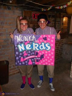 two people standing next to each other holding a sign that says wonka nerds show off your creativity enter contest