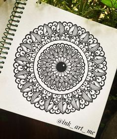 a notebook with an intricate design on it