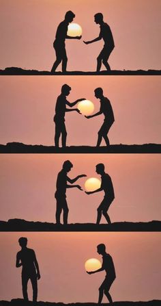 the silhouettes of two people shaking hands at sunset