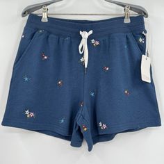 Pj Salvage Sleep Shorts - New With Tags Size: Medium Color: Navy Style #: Rzdds 15.5" Waist, Laying Flat 11.5" Rise 4" Inseam Summer Loungewear Bottoms With Floral Embroidery, Embroidered Relaxed Fit Bottoms For Loungewear, Blue Cotton Short Sleepwear, Blue Cotton Short Length Sleepwear, Embroidered Summer Sleepwear For Loungewear, Floral Embroidered Relaxed Fit Bottoms For Loungewear, Casual Floral Embroidered Bottoms For Loungewear, Casual Floral Embroidered Loungewear Bottoms, Casual Floral Embroidery Loungewear Bottoms