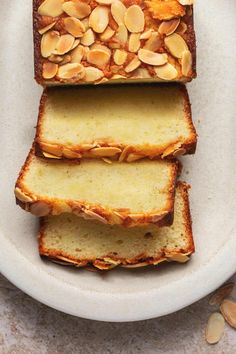 three slices of bread with almonds on top