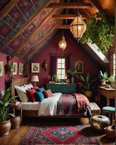 an attic bedroom with red walls and wooden beams, colorful bedding, potted plants